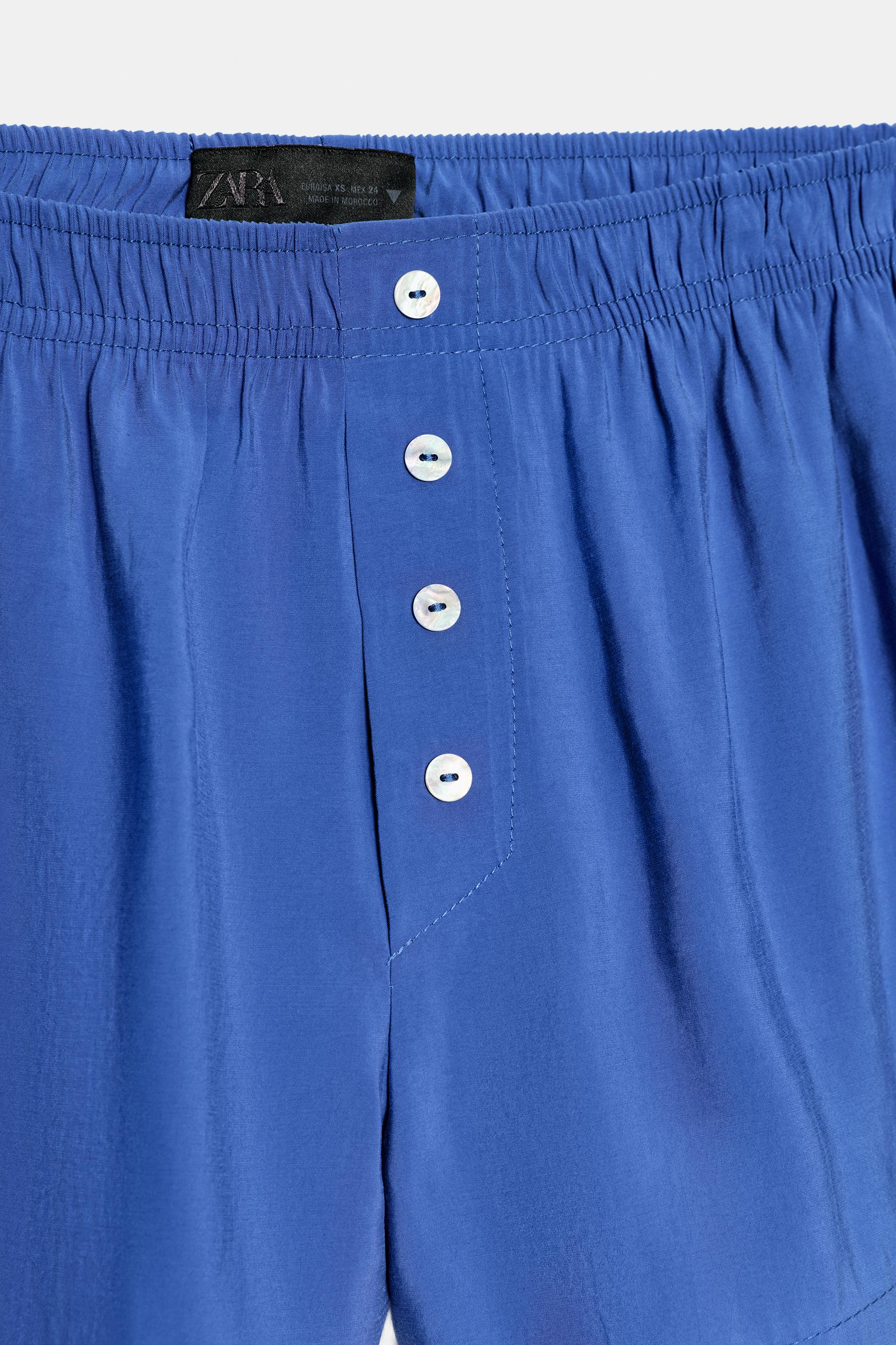 SHORT FLUIDE ÉLASTIQUE BOUTONS